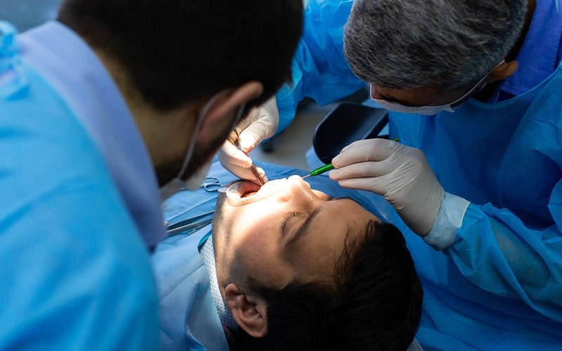 Dental implant surgery procedure performed under local anesthesia